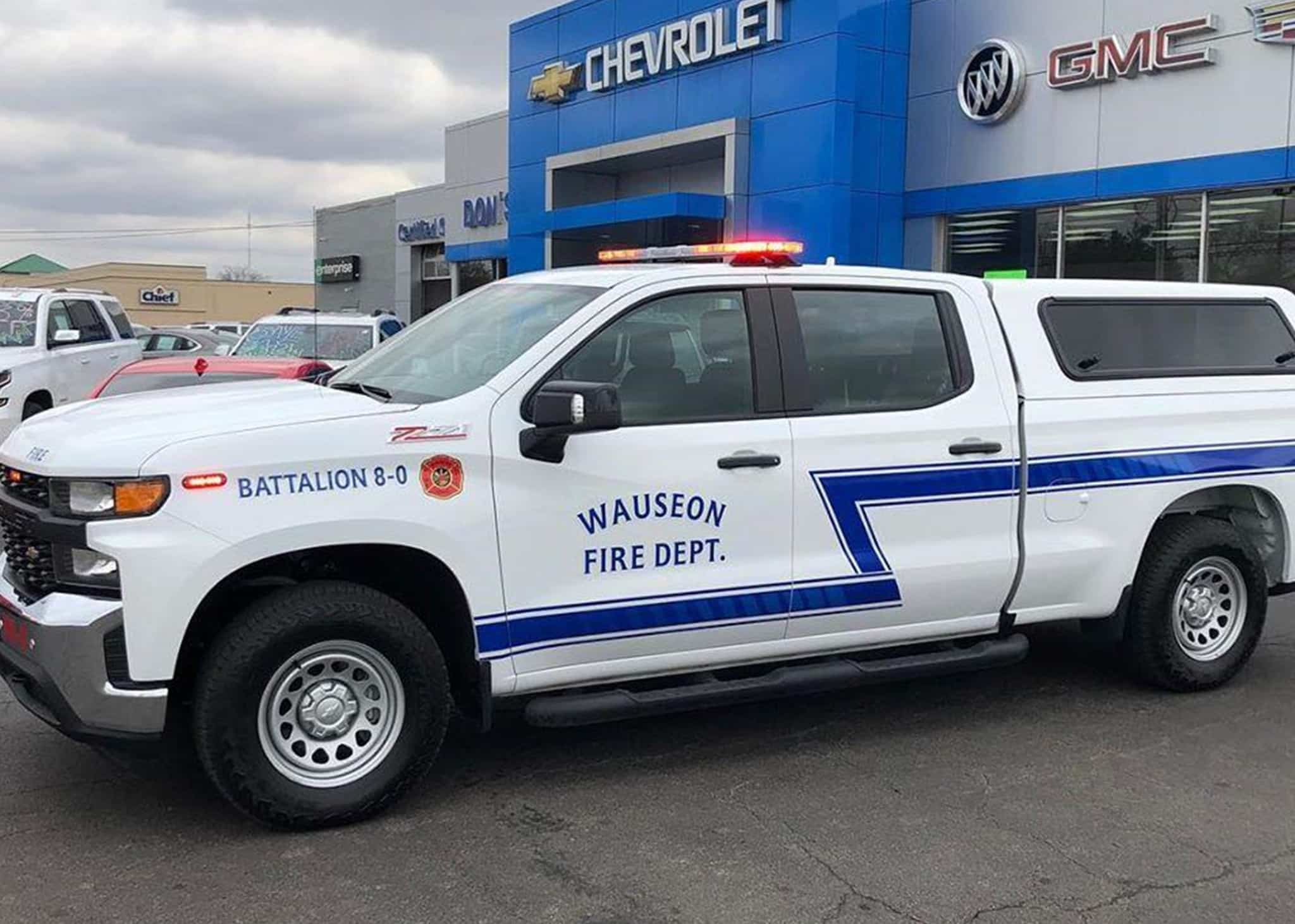 Battalion 8-0 vehicle parked a Chevy dealer parking lot