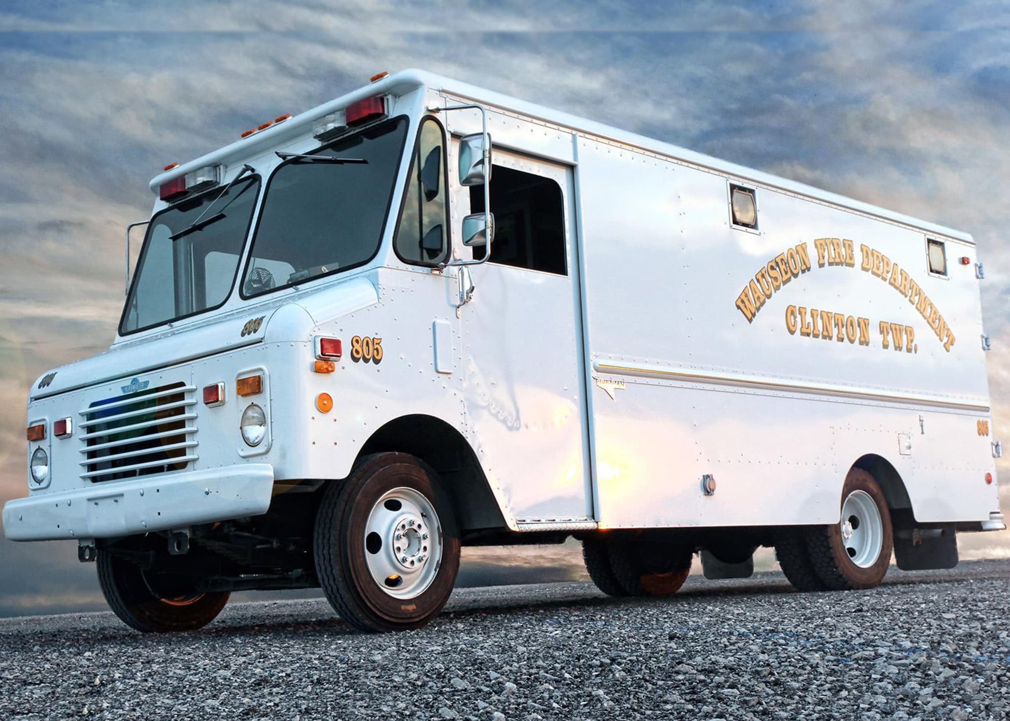 Utility Van 805 parked in gravel